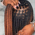 African hair braiding style by The Sister's African Hair Braiding