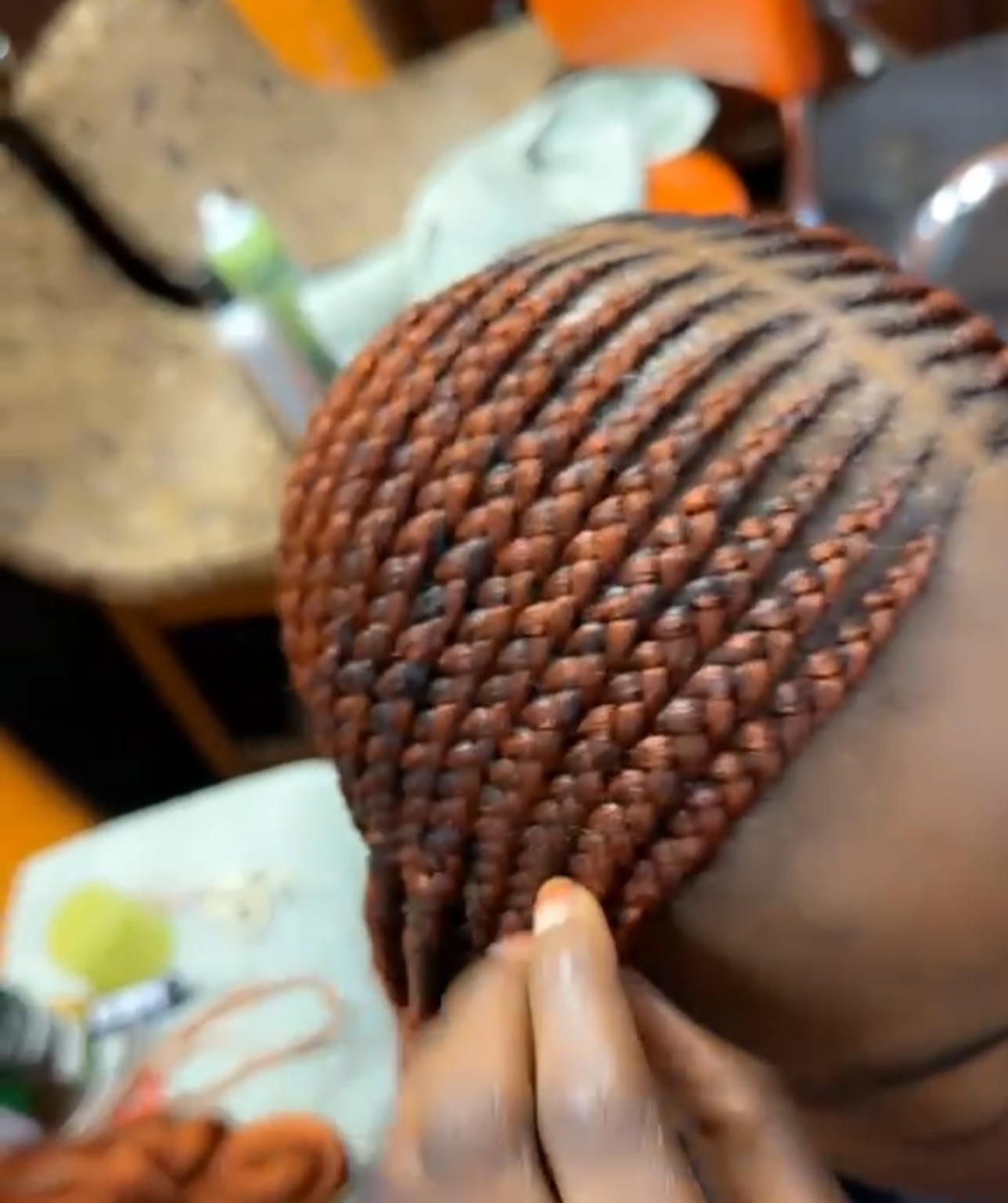 African hair braiding style by The Sister's African Hair Braiding