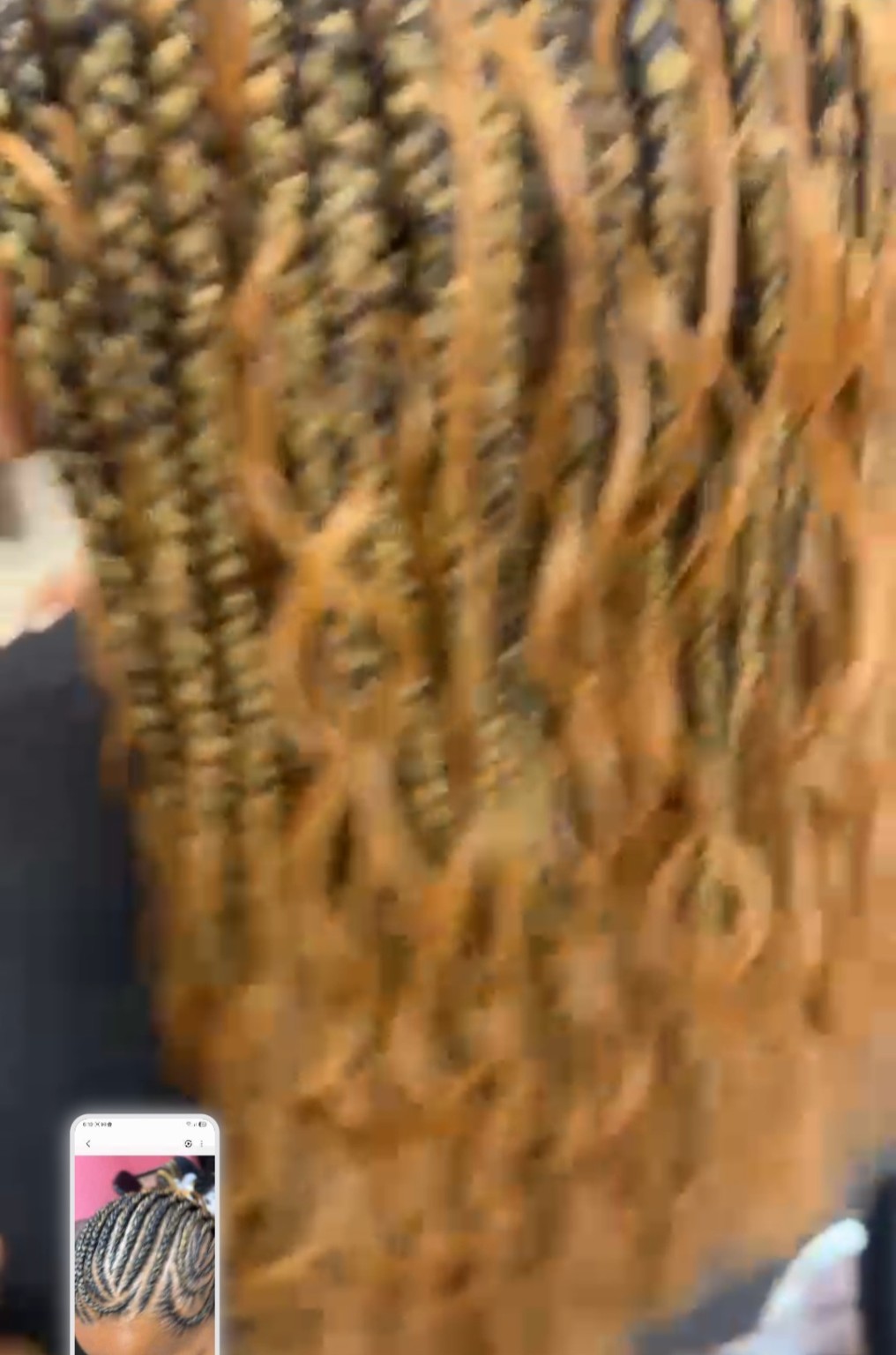 African hair braiding style by The Sister's African Hair Braiding