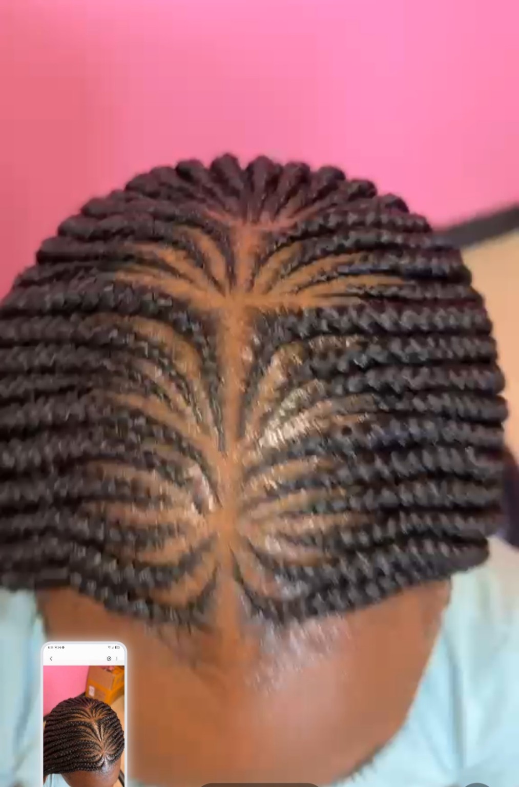 African hair braiding style by The Sister's African Hair Braiding