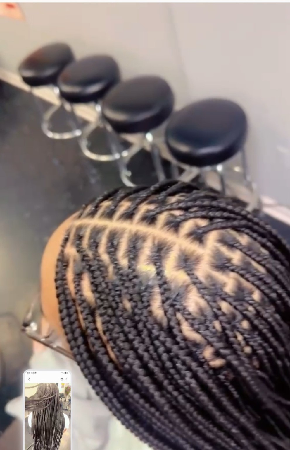 African hair braiding style by The Sister's African Hair Braiding