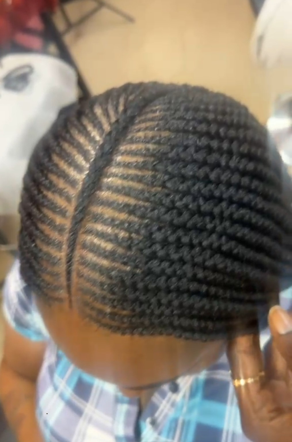 African hair braiding style by The Sister's African Hair Braiding