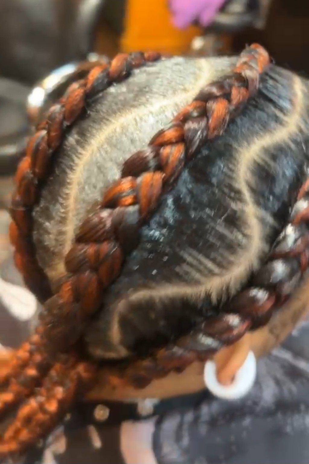 African hair braiding style by The Sister's African Hair Braiding