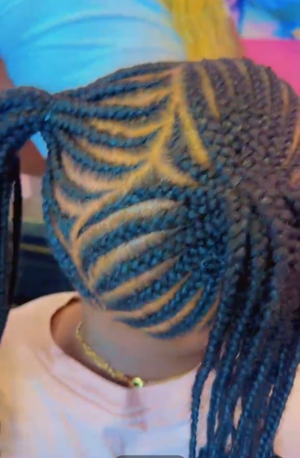 African hair braiding style by The Sister's African Hair Braiding